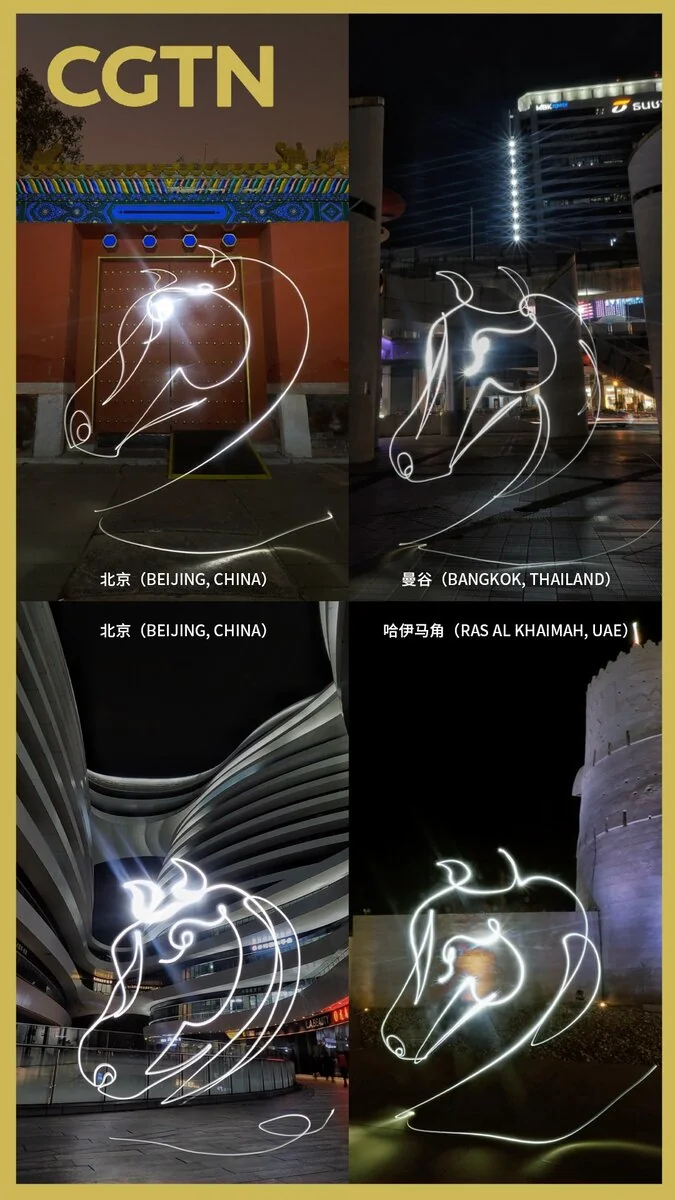 Drawing a horse with light, sharing New Year wishes worldwide